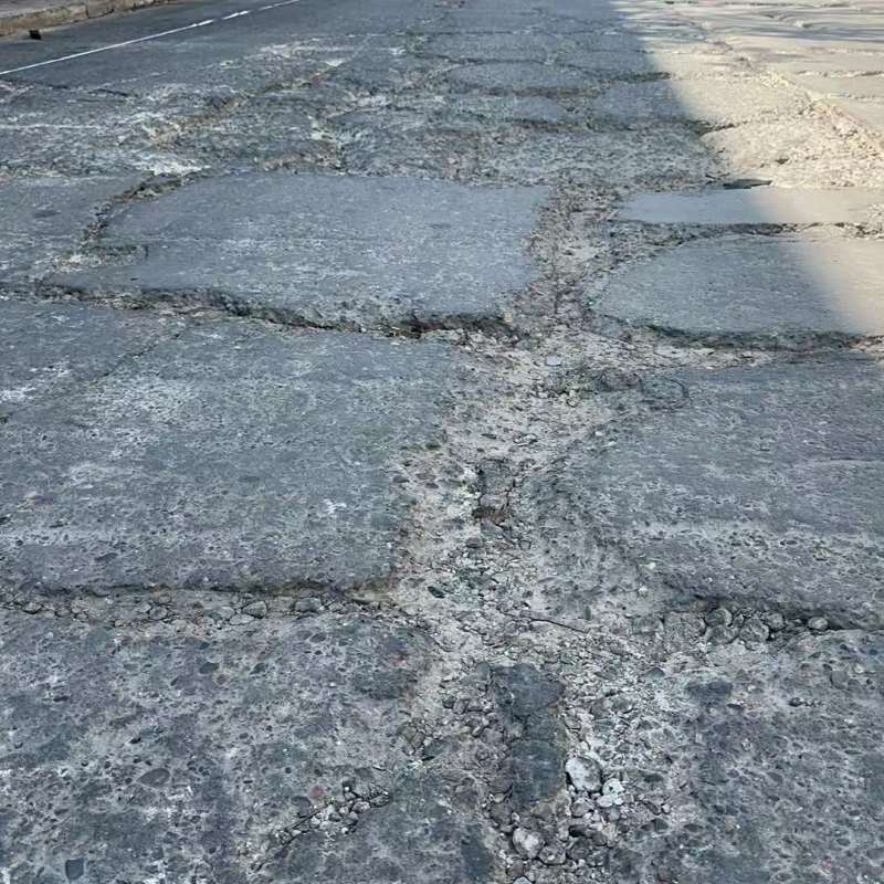 泾川路面起砂露石子修补料